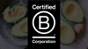 A picture of the B Corp logo on a background with avocados to help shoppers identify good businesses.